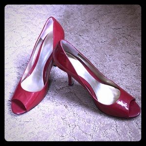 Red patent leather open toe heels